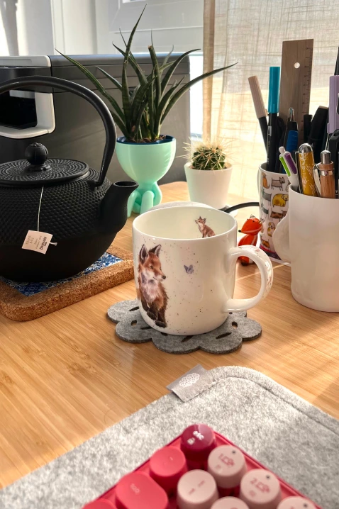 Mug and plants on my desk